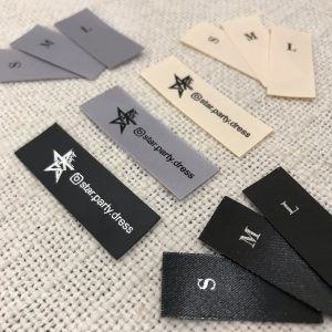 Изготовление бирок для одежды на заказ: важное дополнение к вашему бренду